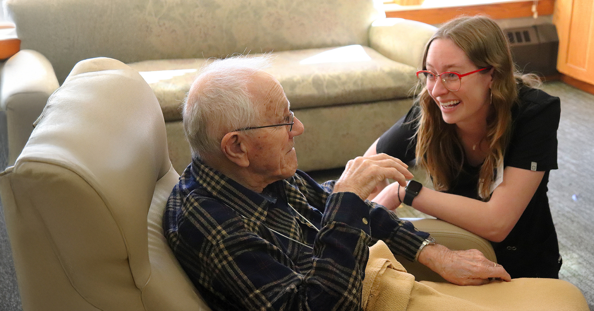 A caregiver with a male Hospice patient
